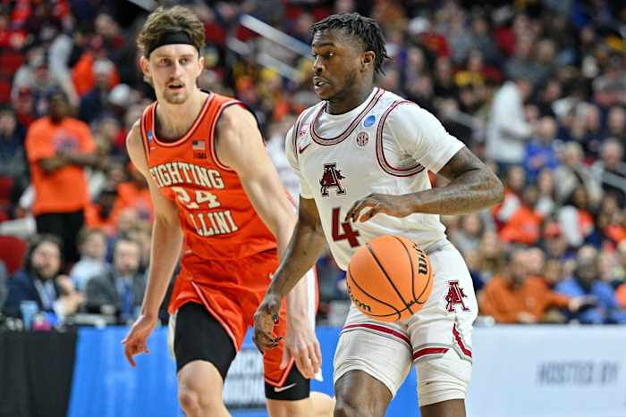 Arkansas Razorback guard Davonte Davis brings the ball up the floor against Illinois in the NCAA Tournament